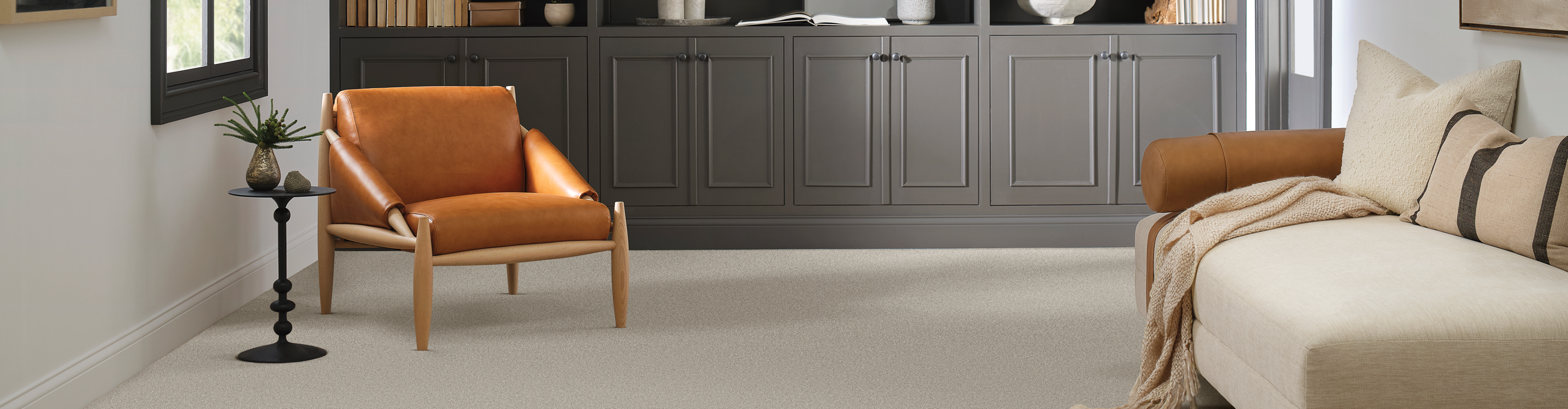 midcentury modern casual sitting area with brown carpet